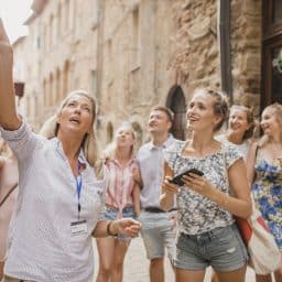 Group of travelers on a guided tour.